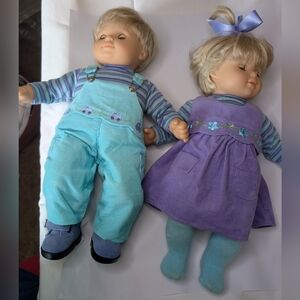 American Girl Twin Dolls Set with Blue and Purple Outfits